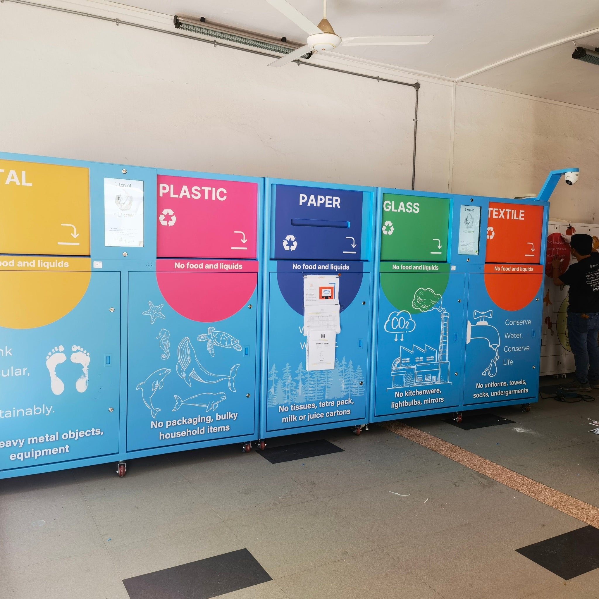 TOMROBOTS' Smart Recycling Machines in Singapore: A Step Towards a Greener Future